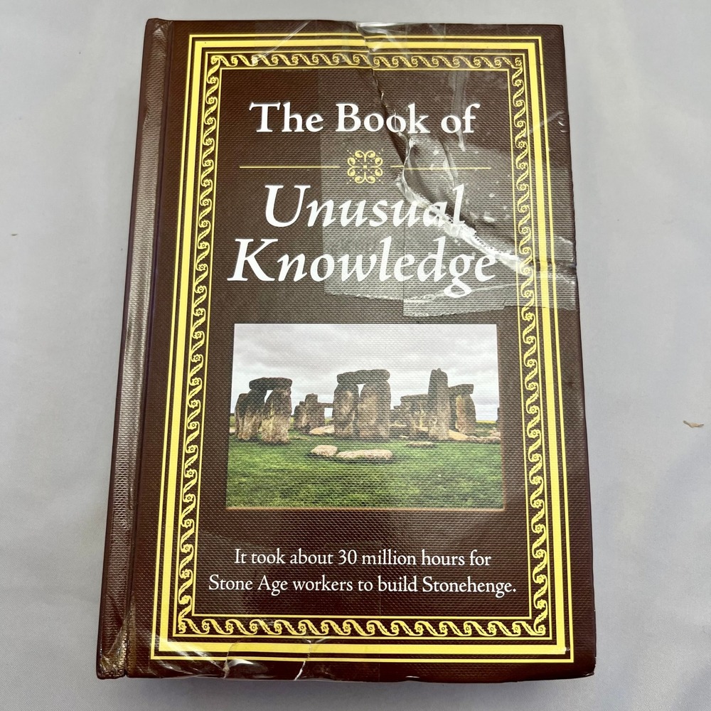 Publications International Book of Unusual Knowledge Brown Hardcover Damaged